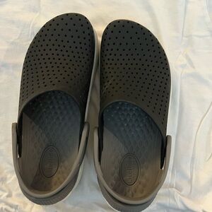Literide by Crocs gender neutral J4 black. Used but in great condition.